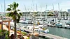 Flere seilbåter fortøyd ved brygger i en marina i Las Palmas.